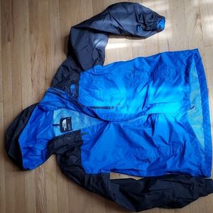 The North Face blue/black jacket with hood.